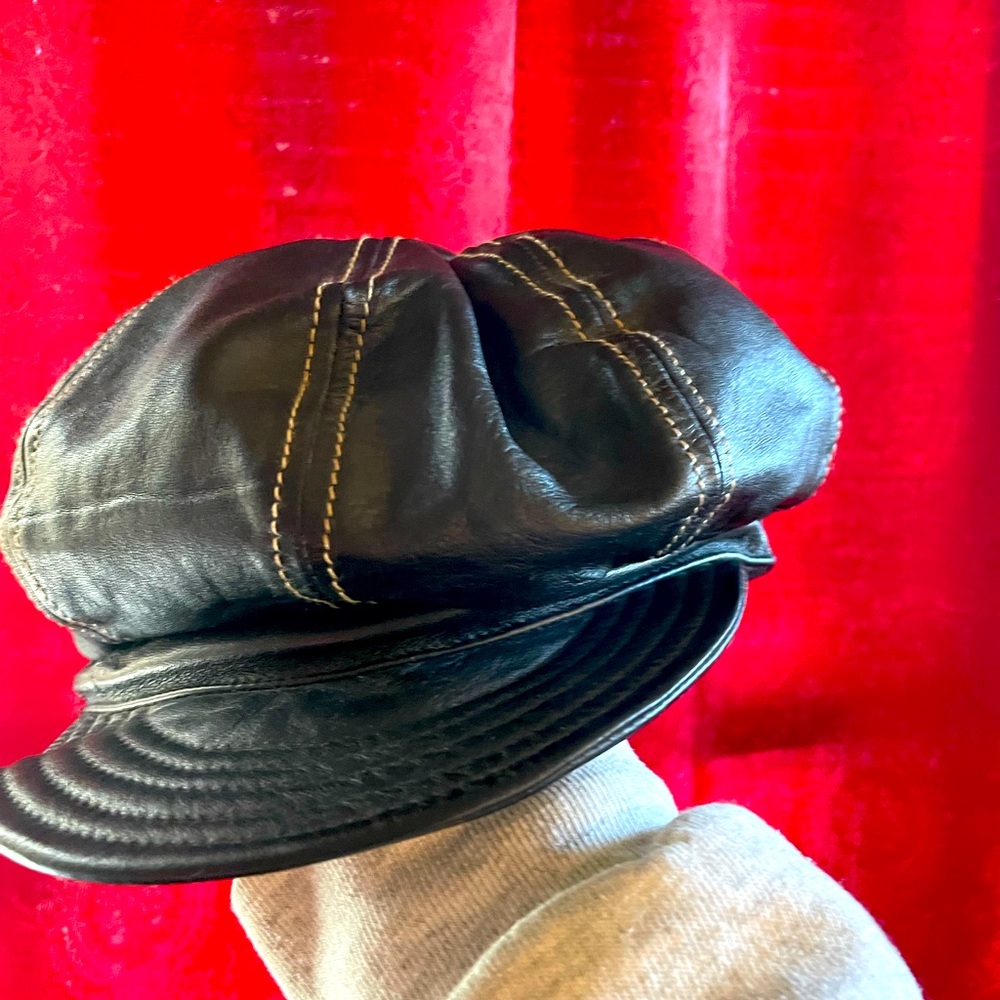 Wilson’s Leather black genuine leather cap.  Lightly Used. Size small.
